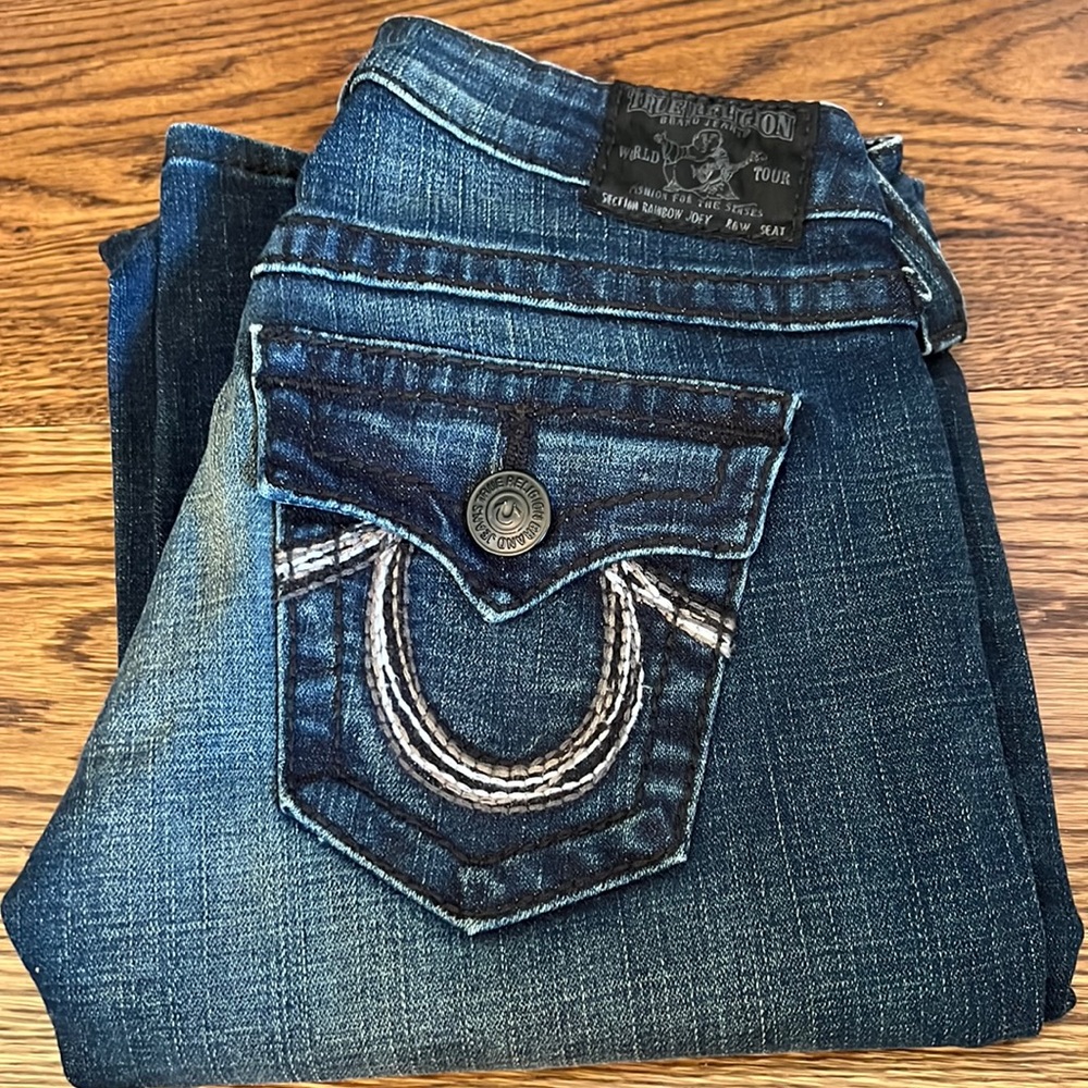 True Religion dark denim flare bottom jeans.  Size 25 Like brand new!!